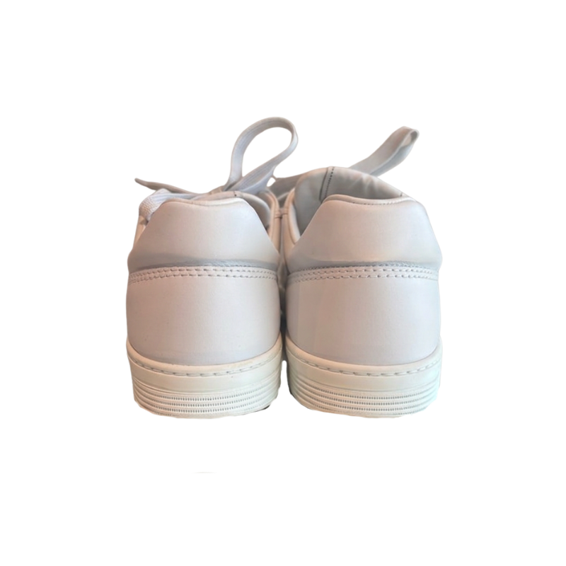 Back of Chanel White Leather Sneakers on a White Background. 