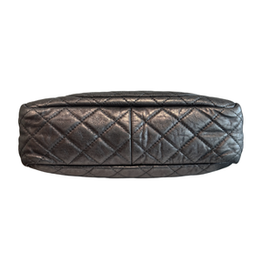 Base of Chanel Quilted Calfskin Leather Medium Reissue Camera Bag on a white background. 