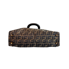 Base of brown Fendi Zucca FF Canvas Tote on a white background. 