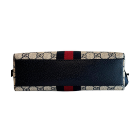 Base of Gucci Ophidia Monogram Dome Bag on a White Background. 