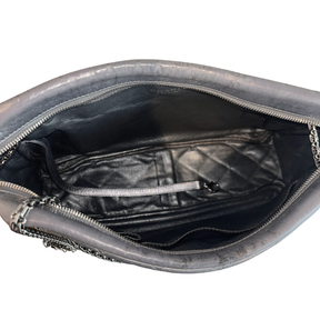 Bird's Eye View of Chanel Quilted Calfskin Leather Medium Reissue Camera Bag on a white background. 