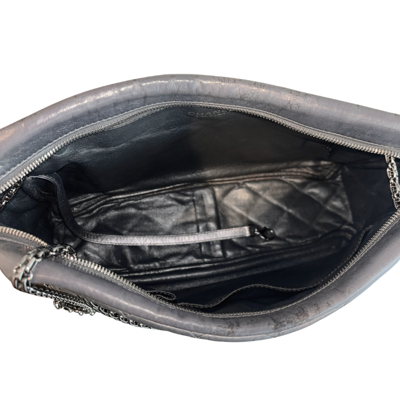 Bird's Eye View of Chanel Quilted Calfskin Leather Medium Reissue Camera Bag on a white background. 