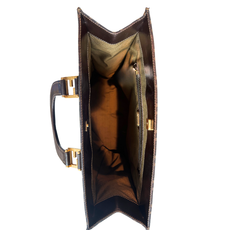 Bird's eye view of brown Fendi Zucca FF Canvas Tote with top handle. Pictured on a white background. 