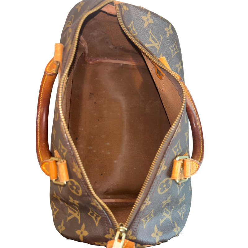 Bird's Eye View of Brown Louis Vuitton Monogram Speedy 30 Boston Bag on a White Background. 