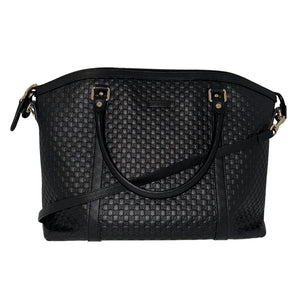 Gucci Microguccissima Dome Satchel&nbsp;  Micro Guccissima Black Leather&nbsp;  Dual Rolled Handles&nbsp;  Detachable Shoulder Straps  Beige Fabric Interior&nbsp;  Zipper Pocket in Interior&nbsp;  Patch Pockets in Interior&nbsp;  Gold-Toned Hardware&nbsp;  Top Zipper Closure&nbsp;