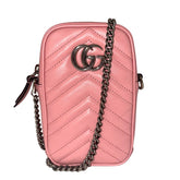 Gucci Marmont Mini&nbsp;  Gucci Crossbody Bag  Pink Leather&nbsp;  Double G Logo  Silver-Toned Hardware  Chain-Linked Shoulder Strap  Chain-Link Accents  Suede Interior&nbsp;  Card Slots in Interior&nbsp;  Zip Closure&nbsp;