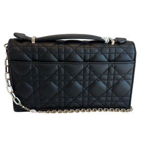 Christian Dior Top Handle&nbsp;

Black Lambskin&nbsp;

Silver-Toned Hardware&nbsp;

Pearls on Chain

Leather Handle

D.I.O.R Charms&nbsp;

Flap Closure&nbsp;