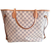 Louis Vuitton Neverfull MM

Neutrals Coated Canvas

Damier Azur Pattern

Brass Hardware

Leather Trim

Dual Shoulder Straps

Leather Trim Embellishment

Logo Jacquard Lining &amp; Single Interior Pocket

Clasp Closure at Top