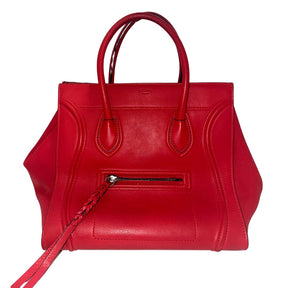 Celine Phantom Bag&nbsp;  Red Leather&nbsp;  Dual Rolled Handles  Braided Accents&nbsp;  Single Interior Pocket&nbsp;  Suede Red Lining Interior&nbsp;  Pull Through Closure at Top  Single Exterior Pocket&nbsp;