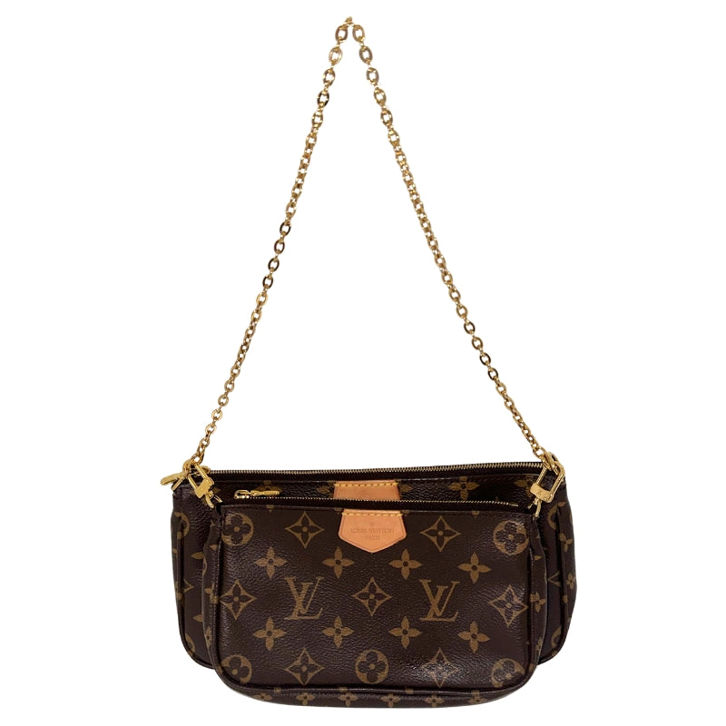 Louis Vuitton Multi Pochette&nbsp;  Brown Monogram Canvas  Gold-Toned Hardware  Gold Chain Strap  Brown Interior&nbsp;  Zipper Closures&nbsp;  Additional Pink Adjustable Strap  Additional Coin Purse&nbsp;