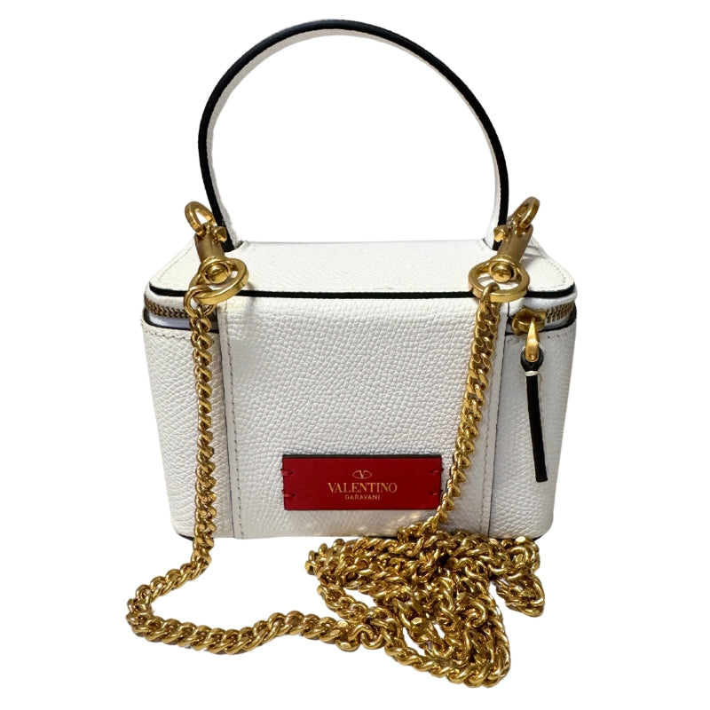 Valentino Vanity Case Mini&nbsp;

White Leather

Gold-Toned Hardware

Chain Link Shoulder Strap&nbsp;

Leather Lining&nbsp;