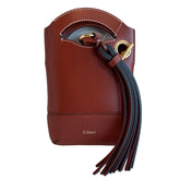 Chloe Mini Walden Bag&nbsp;

Phone Bag

Smooth Brown Leather&nbsp;

Gained Accents

Handles&nbsp;

Chain Strap Included

Gold-Toned Hardware