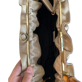 Gucci Floral Tattoo Bamboo Bag

Vintage

Neutrals Leather&nbsp;

Floral Print

Gold-Toned Hardware

Floral Print&nbsp;

Bamboo Handle&nbsp;

Push Lock Closure&nbsp;