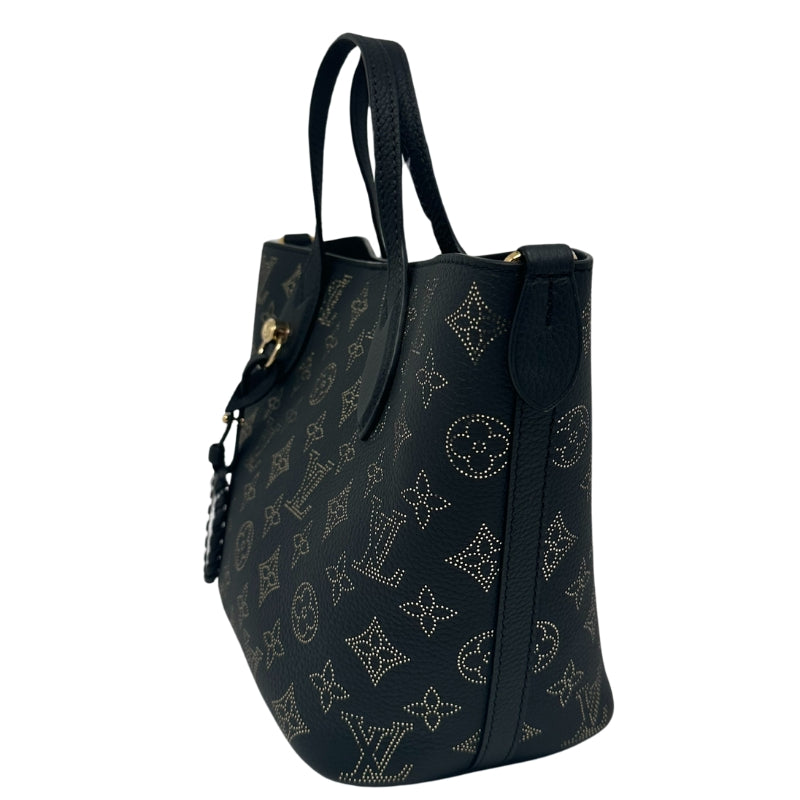 Louis Vuitton Mahina Blossom Bag Perforated Black Leather Gold Detailing Gold-Toned Hardware Dual Straps Detachable Shoulder Straps Clasp Closure at Top Microfiber Interior Includes Pouch Includes Dust Bag