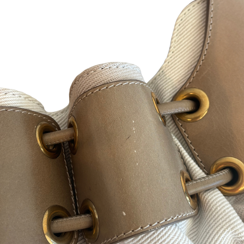 Close Up of Wear on Burberry Mega Nova Warrior Hobo Bag on a White Background. 