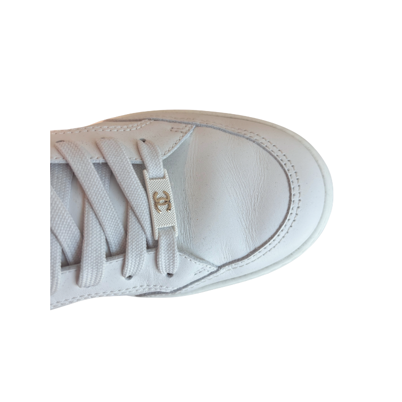 Close up View of Front of Chanel White Leather Sneaker.