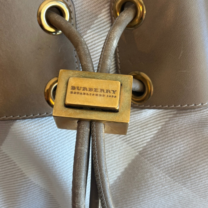 Detail of Gold Logo on Burberry Mega Nova Warrior Hobo Bag