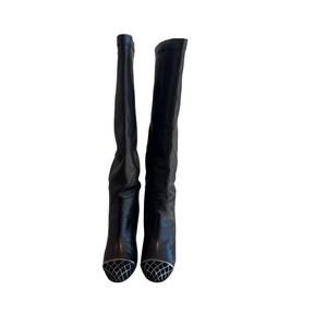 Front of Chanel Interlocking CC Metal Cap Toe Knee-High Leather Boots on a White Background 
