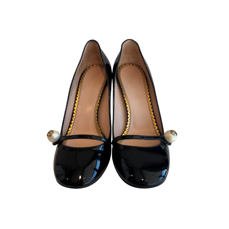 Front of Gucci Patent Leather Crystal Pearl Embellished Mary Jane Heels on a White Background. 