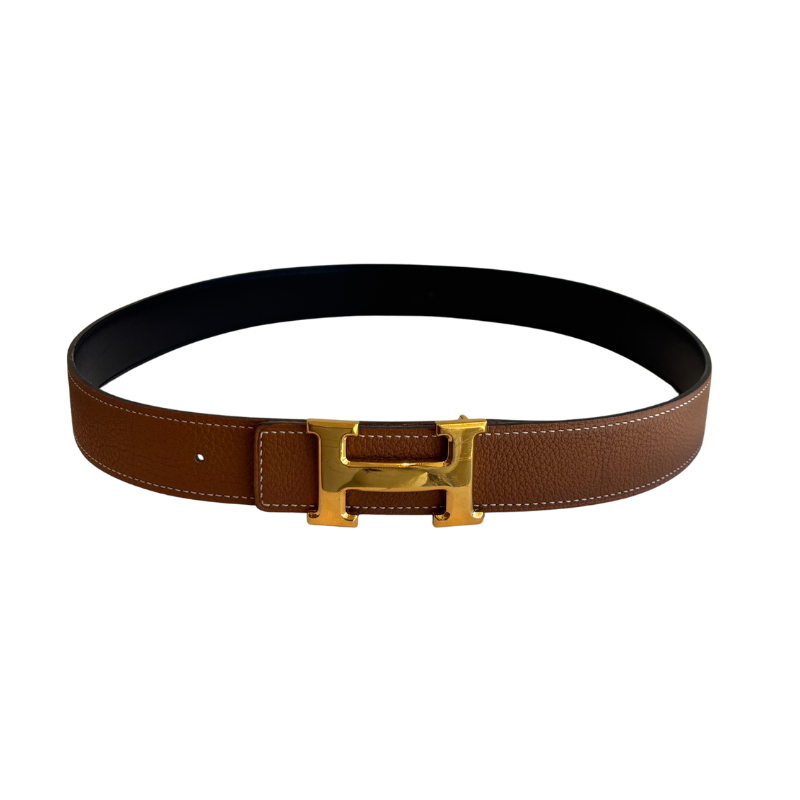 Image of Brown and Black Hermes H Buckle Reversible Belt on a White Background