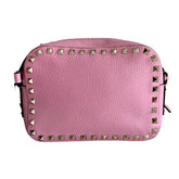 Valentino RockStud Bag&nbsp;

Pink Leather

Camera Crossbody Bag

Suede Interior&nbsp;

Pyramid Stud Detailing&nbsp;

Silver-Toned Hardware