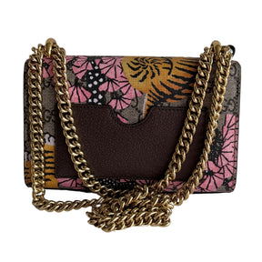 GG Supreme Monogram Shoulder Bag&nbsp;

Beige and Pink&nbsp;

Canvas in Brown with Bengal Tiger

Pink Floral Print

Gold Chain Link&nbsp;

Gold Lock Closure&nbsp;

Front Flap&nbsp;

Shoulder Strap&nbsp;