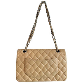 Chanel Classic Double Flap&nbsp;

Neutral Leather&nbsp;

Gold-Toned Hardware

Chain-Link Shoulder Strap

Single Exterior Pocket&nbsp;

Turn Lock Closure&nbsp;

Dust Bag and Box Included&nbsp;