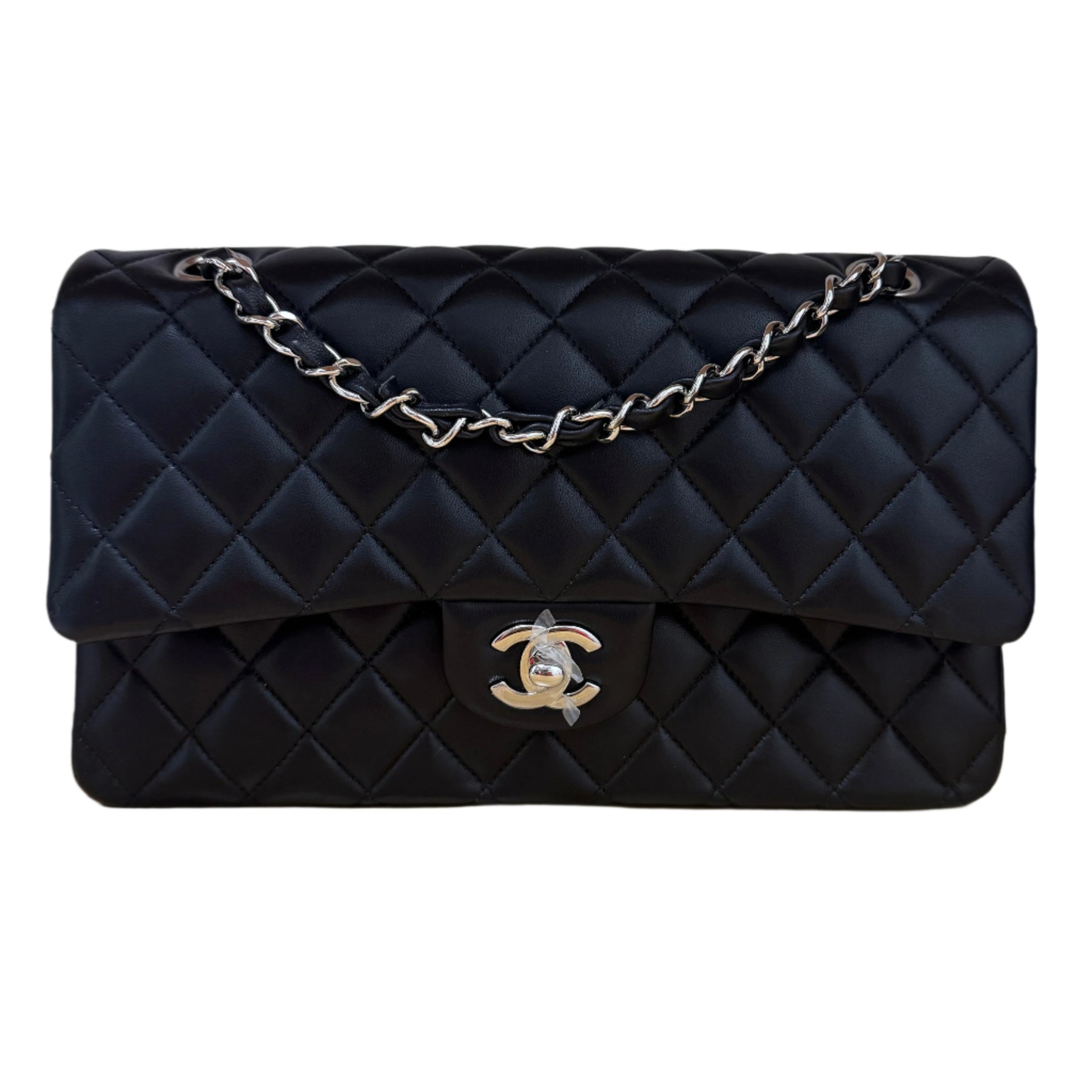 Chanel Quilted Bag&nbsp;

Classic Medium&nbsp;

Double Flap&nbsp;

Black Lambskin&nbsp;

Silver-Toned Hardware

Single Interior Pocket&nbsp;