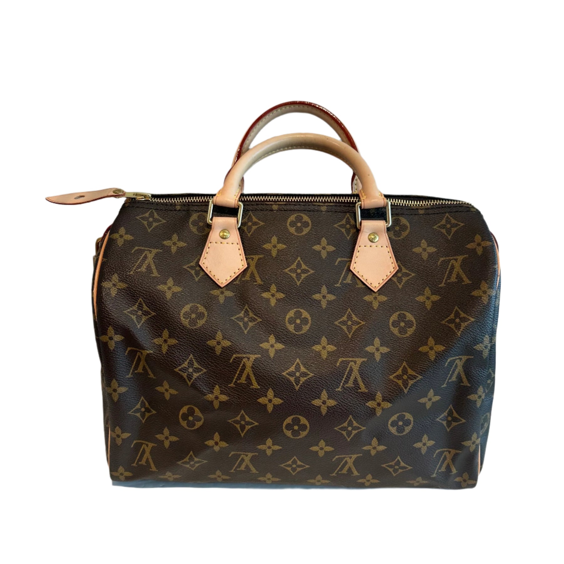 Louis Vuitton Speedy Mono&nbsp;

Louis Vuitton Top Handle Bag

Brown Coated Canvas

Brass Hardware

Leather Trim&nbsp;

Rolled Handles&nbsp;