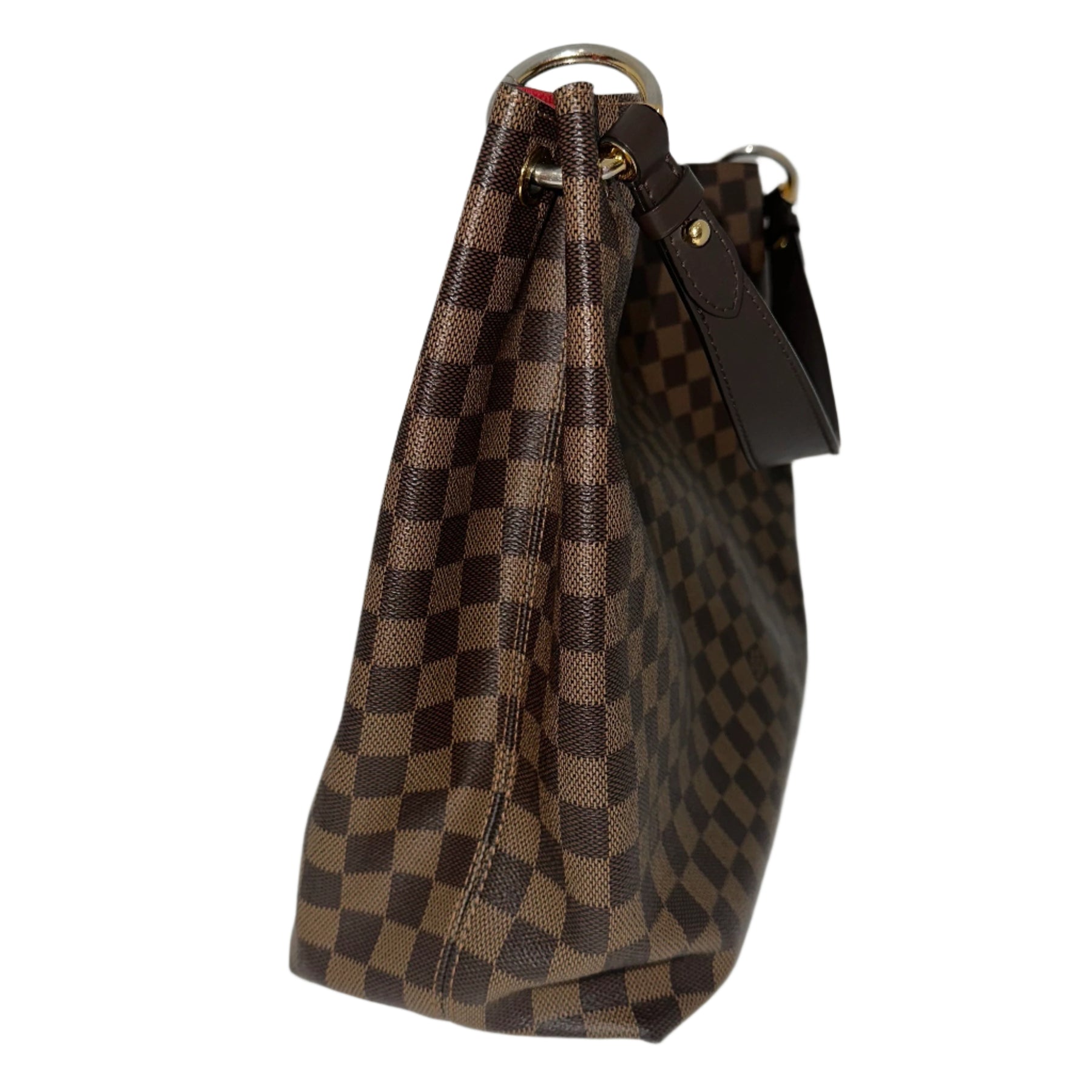 Louis Vuitton Gracefull MM&nbsp;

Louis Vuitton Hobo

Brown Coated Canvas&nbsp;

Damier Ebene Pattern

Brass Hardware

Leather Trim&nbsp;

Flat Handle&nbsp;

Single Interior Pocket&nbsp;