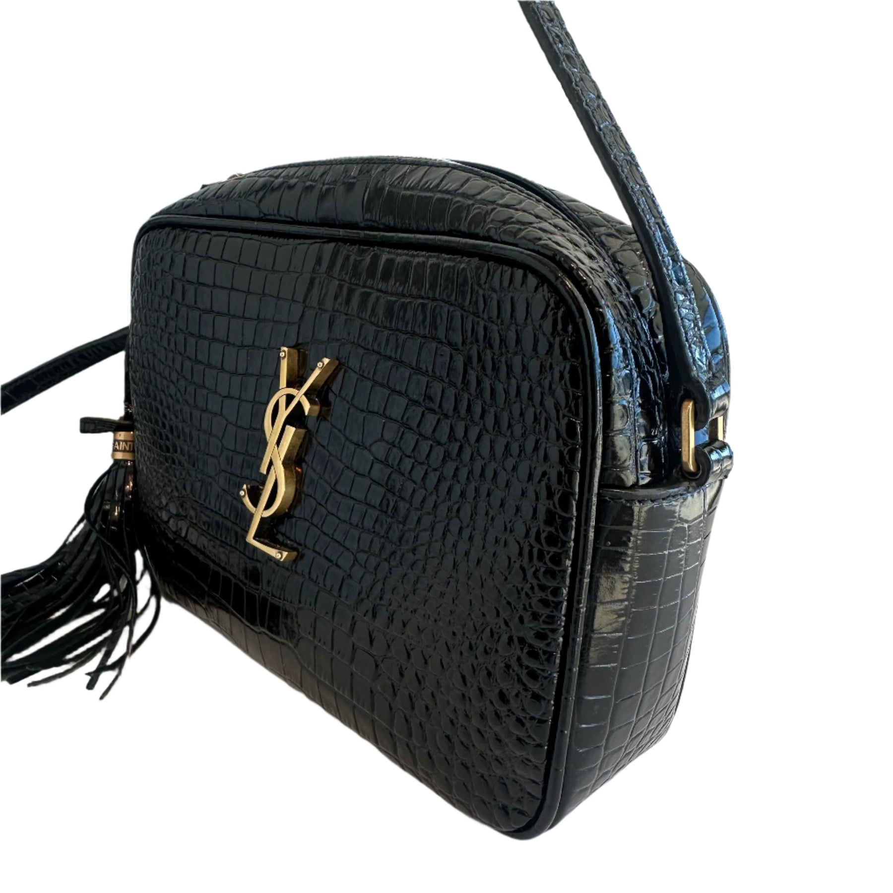 YSL Croc Camera Bag&nbsp;

Saint Laurent Crossbody Bag&nbsp;

Croc Pattern Black Leather&nbsp;

Gold-Toned Hardware

Single Adjustable Shoulder Strap

Tassel Accent&nbsp;