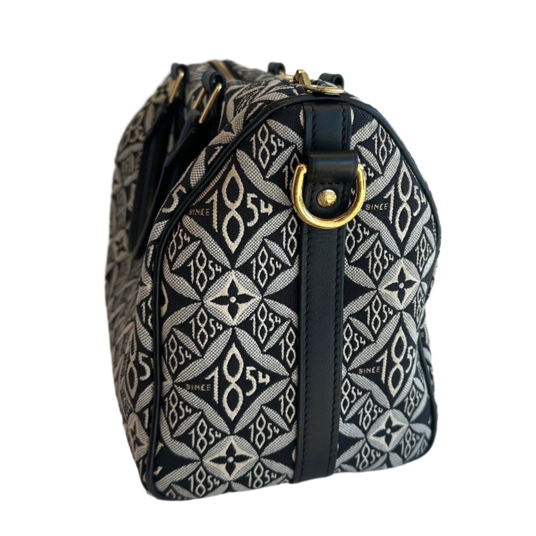 Louis Vuitton 1854 Speedy&nbsp;

Speedy Bandouilere&nbsp;

Black and White Canvas

Black Cowhide Leather Top Handles

Dual Top Handles