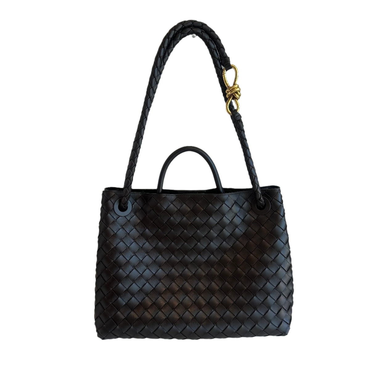 Bottega Veneta Medium Andiamo

Brown Leather&nbsp;

Intrecciato Weave&nbsp;

Gold-Toned Hardware

Rolled Handles&nbsp;

Single Shoulder Strap

Braided Accents&nbsp;

Leather Lining&nbsp;