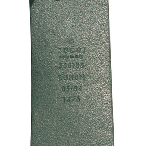 Item Details on Gucci GG Buckle Leather Belt on a white background. 