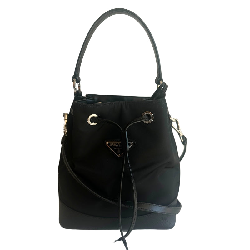 Prada Nylon Bucket Bag&nbsp;

Black&nbsp;

Silver-Toned Hardware

Leather Trim&nbsp;

Flat Handle&nbsp;

Single Adjustabale Strap&nbsp;