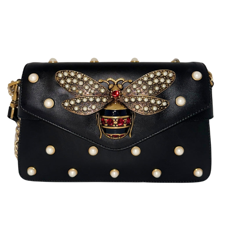 Gucci Broadway Bag

Gucci Shoulder Bag

Black Leather

Sylvie Web Accent&nbsp;

Brass Hardware&nbsp;

Dual Shoulder Straps

Crystal Embellishment&nbsp;

Leather Lining&nbsp;

Single Interior Pocket&nbsp;

Snap Closure at Front&nbsp;