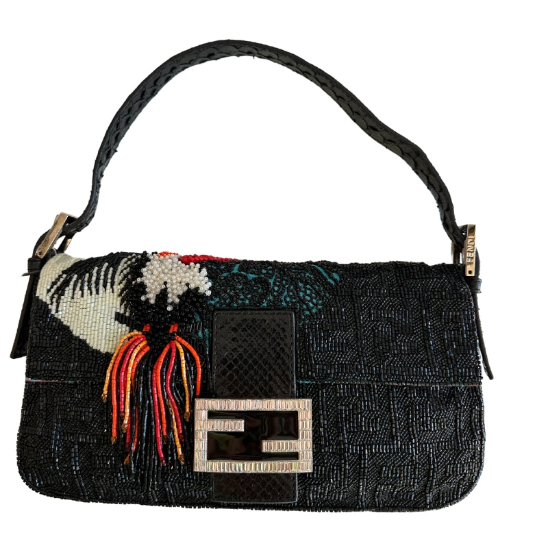 Fendi Bead-Embellished Bag&nbsp;

Baguette Bag&nbsp;

Toucan Embellishment&nbsp;

Beaded Exterior&nbsp;

Silver-Toned Hardware

Flat Shoulder Strap&nbsp;

Buckle Adjustments

Single Pocket&nbsp;

Snap Closure&nbsp;