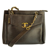 Chanel Vintage Caviar&nbsp;

Brown Caviar Leather&nbsp;

Dual Straps

Gold-Toned Hardware

Multi-Pocket

Chanel Logo&nbsp;