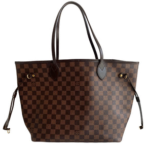 &nbsp;Louis Vuitton Damier Ebene Neverfull MM  Classic Damier Ebene Print Coated Canvas  Leather Trim And Shoulder Straps  Red Striped Fabric Interior  Gold-Tone Hardware  Single Interior Zip Pocket