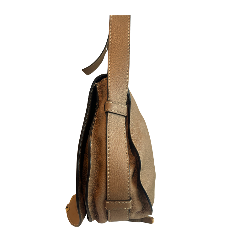 A side profile view of a tan pebbled leather shoulder bag with a matching leather strap, shown against a plain white background.