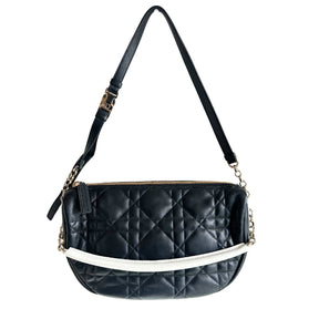 Christian Dior Vibe Hogo Cannage&nbsp;

Black Cannage-Quilted Lambskin Leather

Christian Dior Siganture Logo on Base

Top Handle&nbsp;

Adjustable Shoulder Strap&nbsp;

Gold-Toned Hardware

Zipper Opening&nbsp;

Flat Patch Pocket&nbsp;