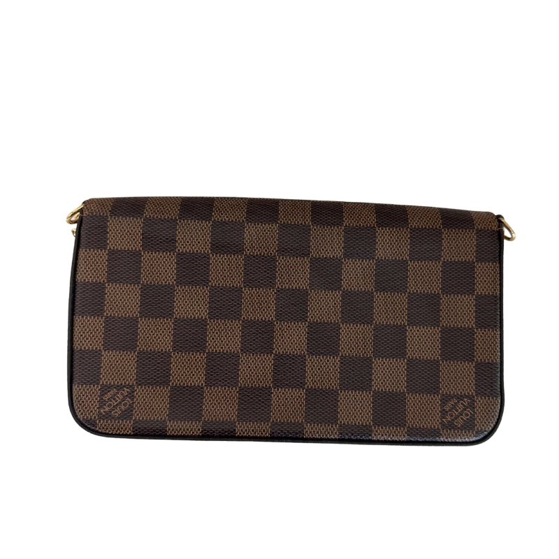 Louis Vuitton Felecie Pochette&nbsp;

Louis Vuitton Shoulder Bag

Brown Coated Canvas

Damier Ebene Pattern

Brass Hardware

Chain-Link Shoulder Strap&nbsp;

Canvas Lining&nbsp;

Detatchable Interior Pouch and Cardholder&nbsp;