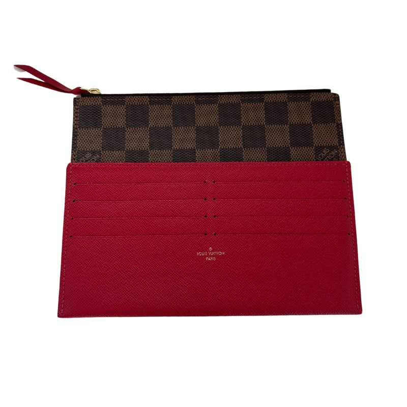 Louis Vuitton Felecie Pochette&nbsp;

Louis Vuitton Shoulder Bag

Brown Coated Canvas

Damier Ebene Pattern

Brass Hardware

Chain-Link Shoulder Strap&nbsp;

Canvas Lining&nbsp;

Detatchable Interior Pouch and Cardholder&nbsp;