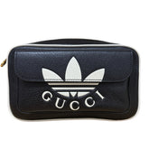 Gucci Trefoli Waist Bag

ADIDAS x Gucci

ADIDAS Motif&nbsp;

Textured Dollar&nbsp;

Black and White Calfskin

Gold-Toned Hardware&nbsp;

Travel Bag&nbsp;

Adjustable Strap&nbsp;

Zipper at Top&nbsp;