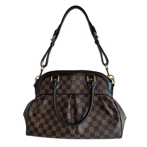 Louis Vuitton Trevi DB&nbsp;  Louis Vuitton Damier Coated Canvas  Brown Canvas  Gold-Toned Hardware  Rolled Handles  Brown Cowhide Leather Trim&nbsp;  Optional Shoulder Strap&nbsp;