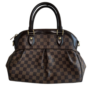 Louis Vuitton Trevi DB&nbsp;  Louis Vuitton Damier Coated Canvas  Brown Canvas  Gold-Toned Hardware  Rolled Handles  Brown Cowhide Leather Trim&nbsp;  Optional Shoulder Strap&nbsp;