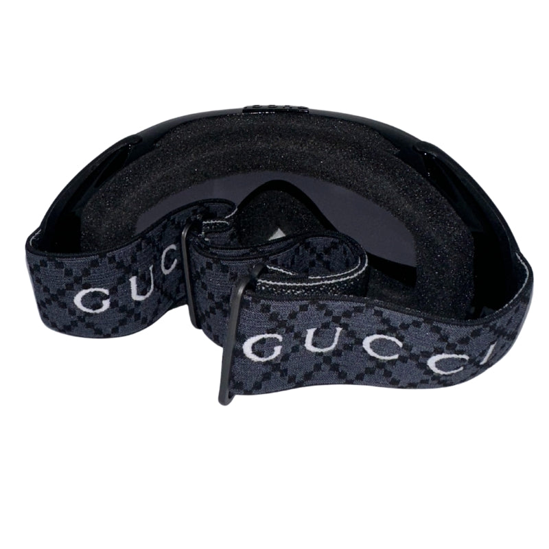 Gucci Ski Goggles&nbsp;

Black Matte&nbsp;

Grey and Black Web Straps

Silver Toned Hardware&nbsp;