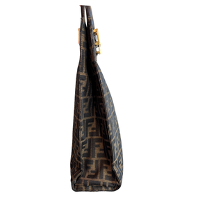 Ride Side of brown Fendi Zucca FF Canvas Tote on a white background. 
