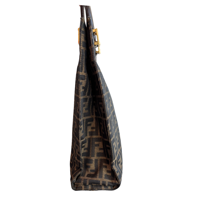 Ride Side of brown Fendi Zucca FF Canvas Tote on a white background. 