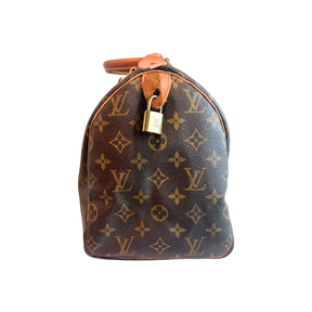Right Side of Brown Louis Vuitton Monogram Speedy 30 Boston Bag on a White Background. 